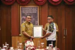Bupati Bogor Apresiasi Tim FPTI Kibarkan Bendera Merah Putih Terbesar di Tebing